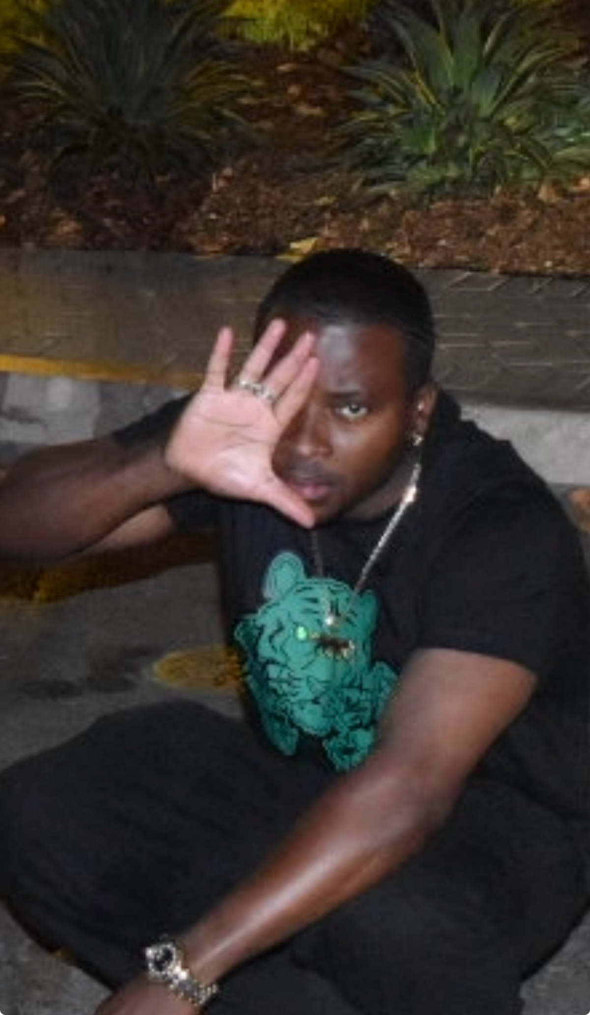 HUSL-CAT founder Patrick ‘Tigur-Eye’ Onochie Onwuekwe wearing a black HUSL-CAT T-shirt